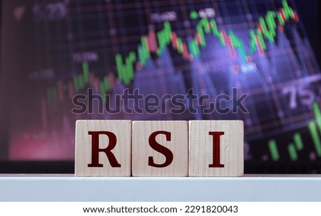 RSI - acronym from wooden blocks with letters, Relative Strength Index. Financial market concept