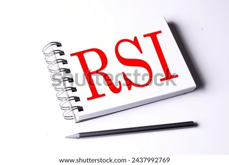 RSI word on notebook on the white background 