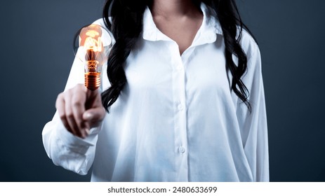 rtificial Intelligence (AI) concept of a mobile brain with a wireframe shining neural network in the bulb of business network technology innovation.