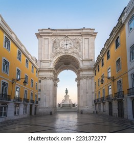 Rua Augusta and Rua Augusta Arch with King Dom Jose I Statue on background - Lisbon, Portugal