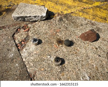 Rubber Bullet And Tear Gas Canister Closeup On Steet -