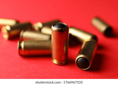 Rubber Bullets On Red Background, Close Up