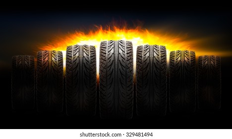 Rubber Car Tire With Fire Blaze On Dark Background