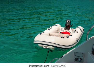 Rubber  Dinghy  On The Emerald Green Sea