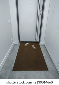 Rubber Door Mat, Front Door, Home With Traces Of Dirt And Snow