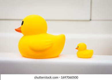 Rubber Duck Family, Mother And Baby Duck On The Edge Of Bath Tub