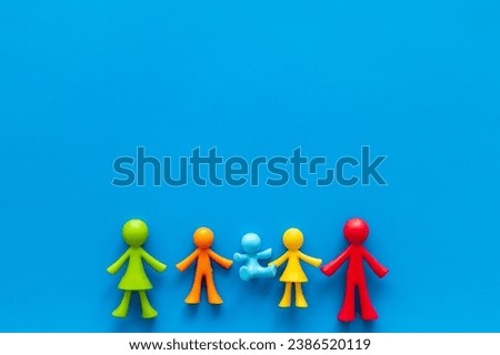 Rubber figurines of people - family concept. Top view.
