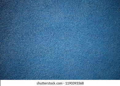 Rubber floor texture. Granules playground cover background.