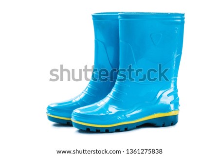 Similar – Image, Stock Photo Shiny rubber boots in the rain in front of a puddle-