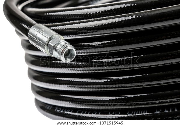 rubber hose with\
nozzle on a white\
background
