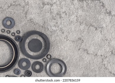 Rubber Products Gaskets And Seals Of Round Shape For Connecting Automotive Parts. Heat-resistant, Acid-alkali-resistant And Oil-and-petrol Resistant Technical Plates And Rings With Copy Space.