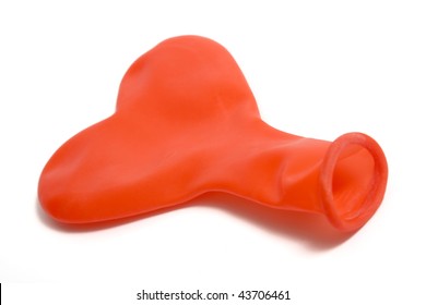 The Rubber Red Balloon Is Isolated On White. Concept False Love, Counterfeit Feelings.