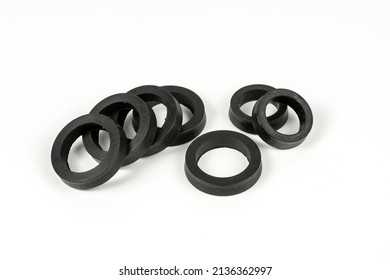 A Rubber Ring - A Gasket, An Oil Seal For Repairing A Car Brake Caliper On A Plane. Set Of Spare Parts For Car Brake Repair. Details On White Background, Copy Space Available.