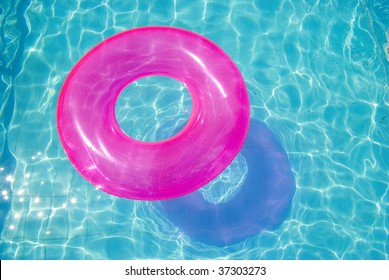 rubber ring in the swimming pool sunny day
