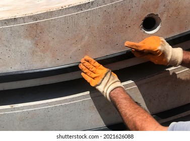 Rubber Seals Are Applied To Concrete Tunnel Segments.