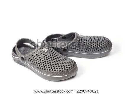 Rubber slippers of gray color men's large size with a folding back.