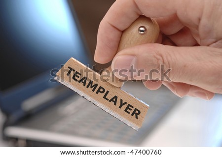 rubber stamp with inscription TEAMPLAYER