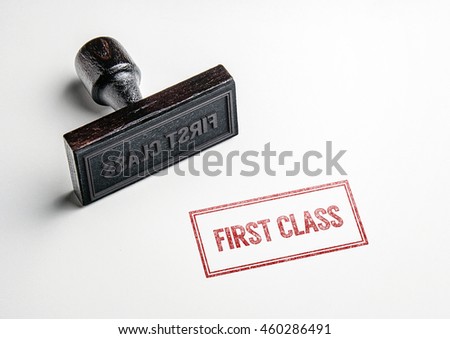 Rubber stamping that says 'First Class'.