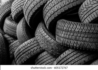 Rubber tire recycling. old used car tires  at a junkyard in piles waiting for recycle.