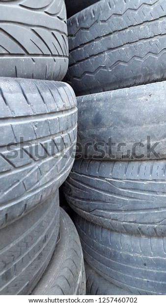 Rubber. Tire. Rubber surface. Wheel\
protector. Tire tread photo. Car wheel protector close\
up