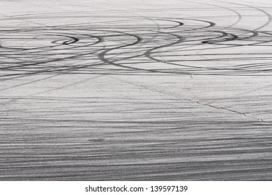 Rubber Tire Track On An Asphalt Road