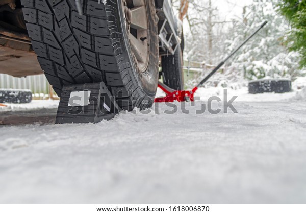 Rubber Wheel\
Chock, anti-rollback stop under the wheel of the car on the snow.\
Wheel Chocks anti-skid Vehicle\
Wheel.