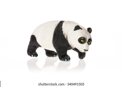 A Rubber(plastic) Toy Of Panda Bear Side View Isolated White.