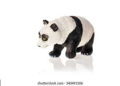 A Rubber(plastic) Toy Of Panda Bear Side View Isolated White.