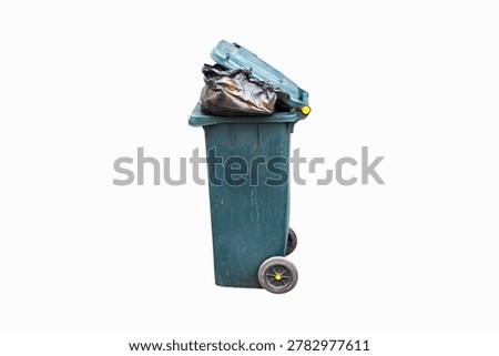 Rubbish bin garbage square shape green with flip cover black bag inside casters isolated on white background. Old dirty trash cans plastic. Waste collection equipment in park.