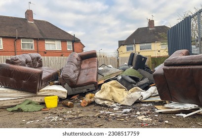 rubbish tipped by fly tippers on a housing estate