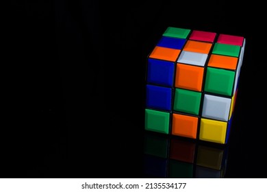 Rubik's cube on black. Puzzle concept. Brain quiz