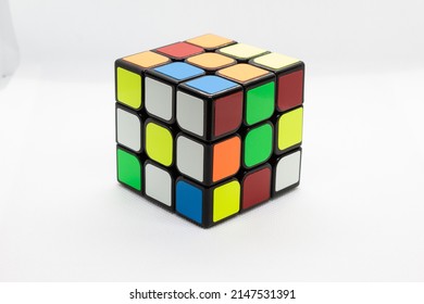 Rubik's cube on the white background. Rubik's Cube invented by a Hungarian architect Erno Rubik in 1974. Editorial Only.