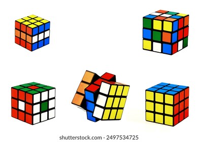 A Rubik's cube. puzzle. a mathematical problem. On a white isolated background.colorful cubes.They rotate them and collect them with their hands.Russia.Moscow.26.12.2023