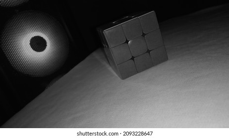 Rubix Cube White And Black On The Space