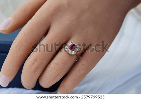 Ruby baguette diamond ring on photomodel