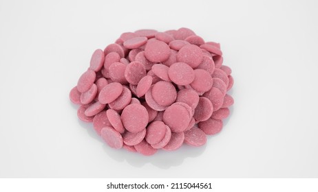 Ruby chocolate chips on white background. Confectionery concept
