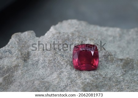     Ruby on gray stone background                           