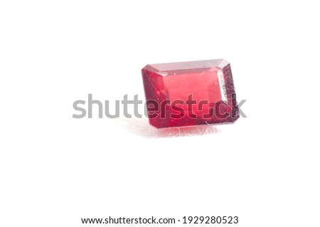 ruby red garnet jewel crystal on a white background