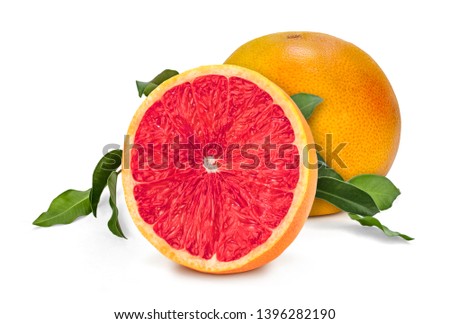 Ruby Red Grapefruit with leaves on a white background. They were given the name grapefruit because of the way they grow in clusters similar to grapes.