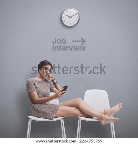 Rude woman resting with feet up in the waiting room and connecting with her smartphone, she is waiting to have a job interview [[stock_photo]] © 