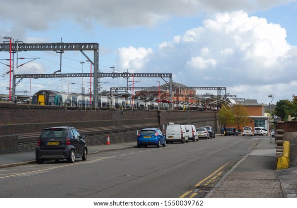 RUGBY, ENGLAND - SEPTEMBER 26,\
2019: View of Railway Terrace and Rugby railway station in\
England