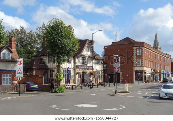 RUGBY, ENGLAND -\
SEPTEMBER 26, 2019: View of Park Road/North Street with The\
Courthouse pub in Rugby,\
England
