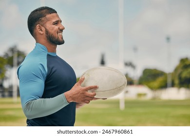 Rugby, field and happy man with ball, confidence and pride in winning competition game. Fitness, sports and happiness, professional player with smile, ready for match and workout on grass at stadium. - Powered by Shutterstock