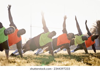Rugby, fitness and team at training for competition or morning match doing warm up exercise on grass. Wellness, teamwork and group of players stretching or workout together in professional sports - Powered by Shutterstock