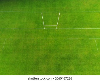 Rugby And Irish National Sports Camogie, Hurling, Gaelic Football Tall Goal Posts In A Green Grass Training Field. Aerial Drone View.