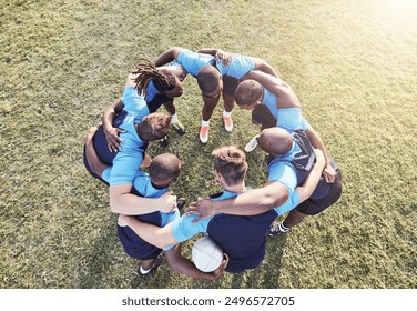 Rugby, men and huddle of team with fitness, motivation and pride in competitive game. Collaboration, sports and teamwork, diverse players ready for match, workout or tournament above field at club - Powered by Shutterstock