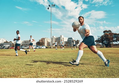 Rugby, pass and men on field for practice training, competition or game routine on pitch. Throwing ball, athletes or players in outdoor stadium with teamwork for workout, match or fitness exercise - Powered by Shutterstock