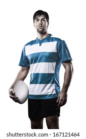 Rugby Player In A Blue Uniform. White Background