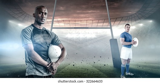 Rugby player holding rugby ball against rugby stadium - Powered by Shutterstock