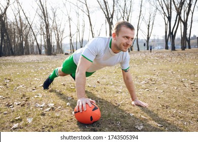 Rugby Player Kneads Before Training, Outdoor